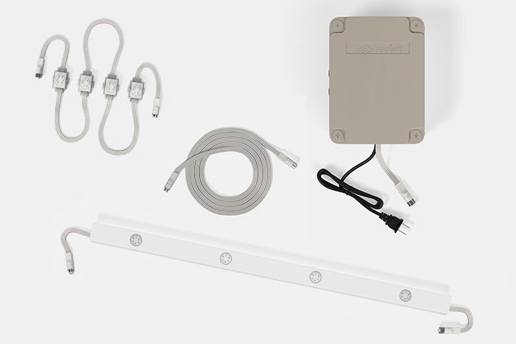 Permanent roofline lights DIY kit—controller, RGBW nodes, channel section, and cables.