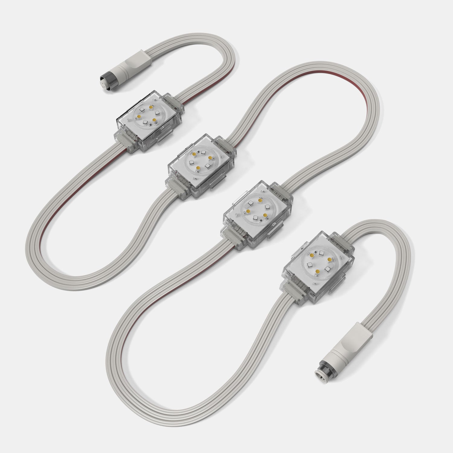 Close-up of RGBW roofline light nodes on low-profile harness with waterproof connectors.