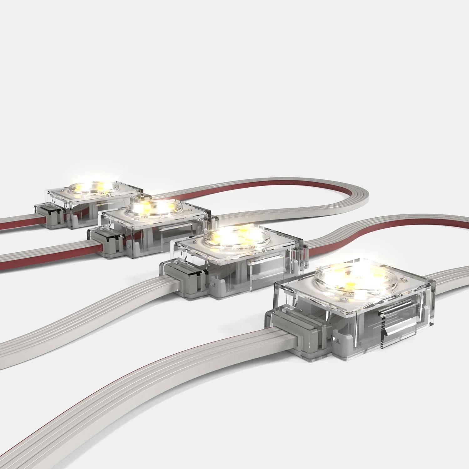 RGBW nodes emitting warm white light, close-up on harness.