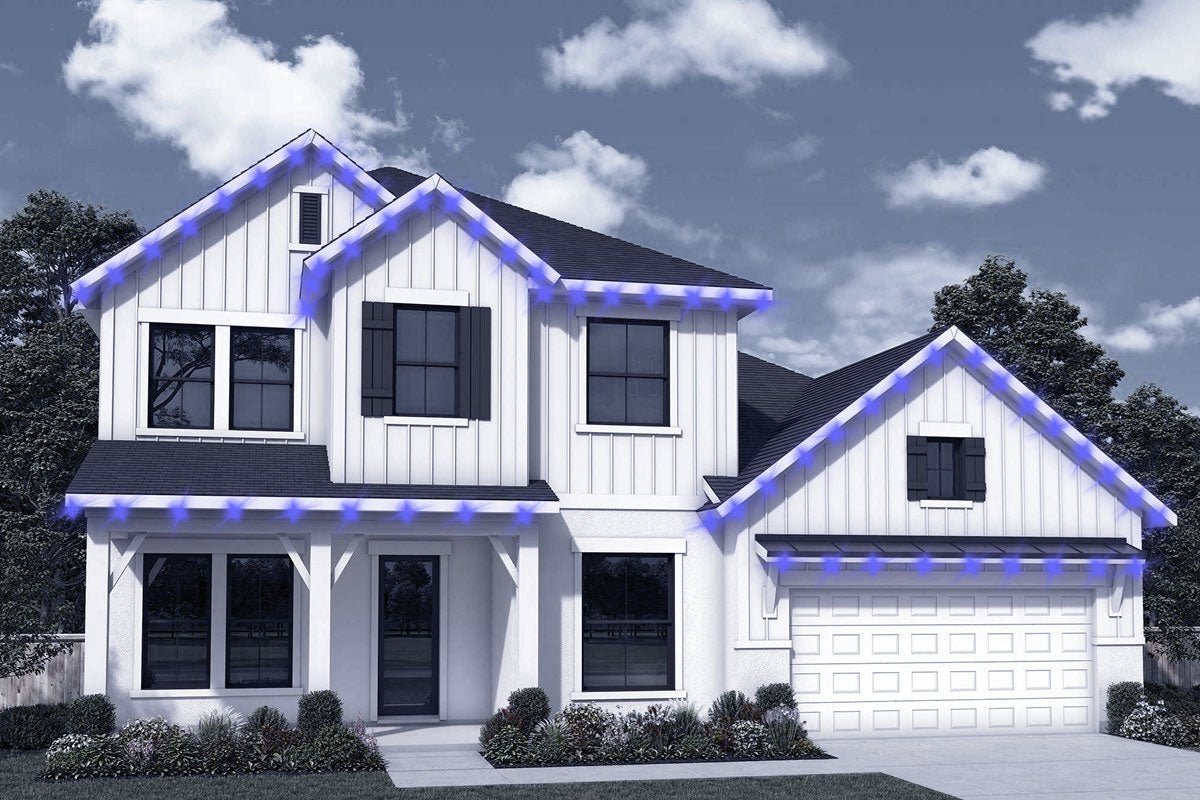 Two-story modern farmhouse with board-and-batten—roofline light placement example.