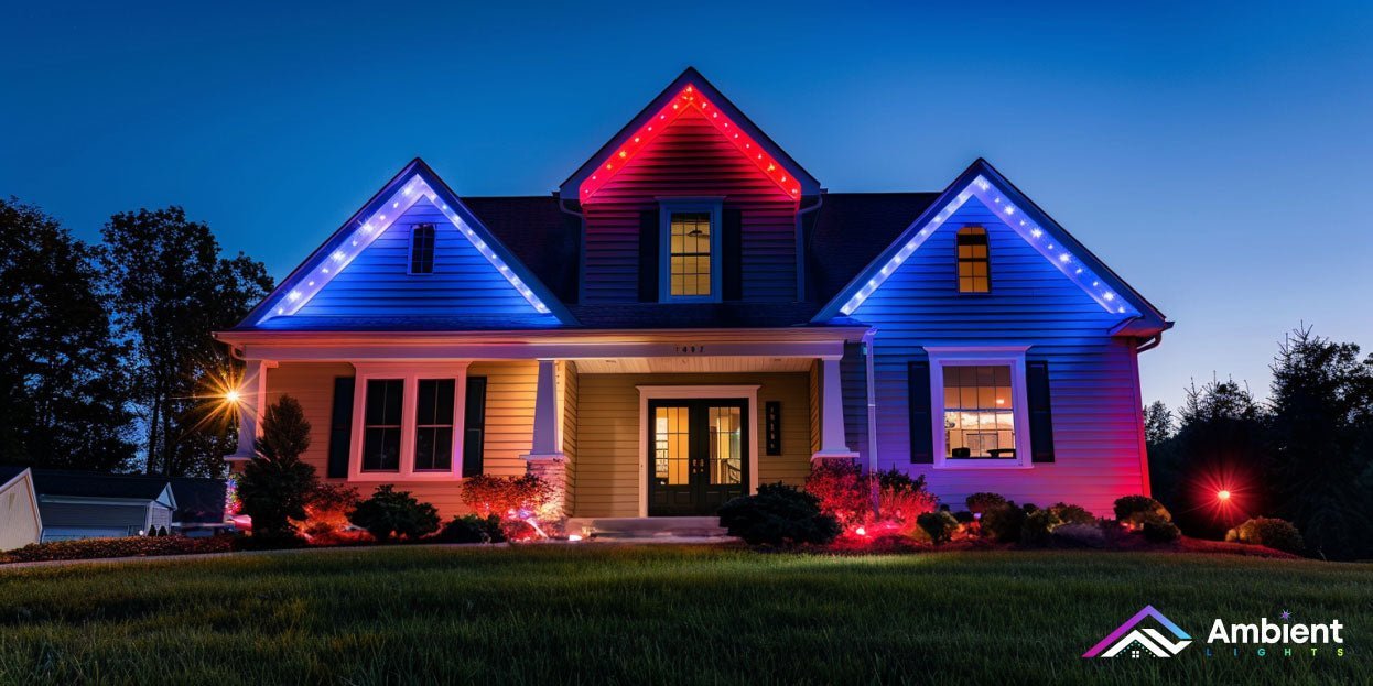Single-story home with permanent roofline lights in red, white, and blue holiday pattern.